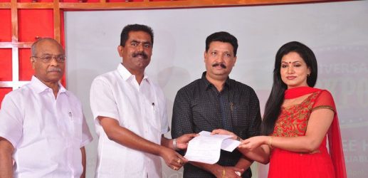 Mumbai-based businessman Abraham Mathew and wife, cine artist Sheela Abraham, handing over the documents of the first booking in the Anniversary Jackpot offer.