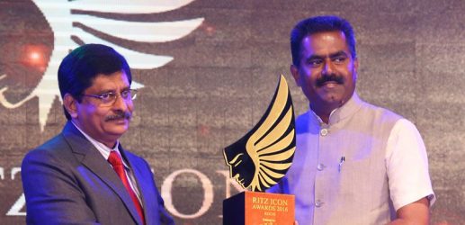 Shri. Sunil Kumar V, MD of Asset Homes being awarded with the Ritz Business Icon of the Year 2016 by Justice Surendra Mohan, High Court of Kerala.